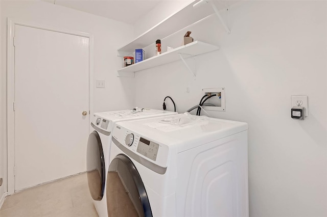 washroom featuring washer and dryer