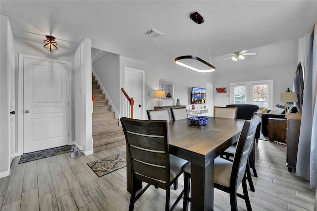 dining space featuring ceiling fan