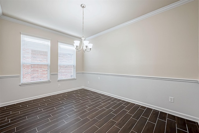 empty room featuring baseboards, dark wood-style flooring, a chandelier, and crown molding