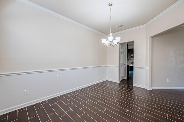 spare room featuring baseboards, visible vents, dark wood finished floors, crown molding, and a notable chandelier