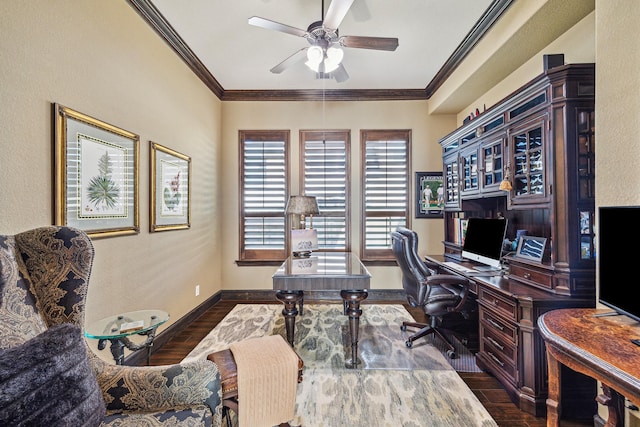 office space featuring crown molding, ceiling fan, and dark hardwood / wood-style flooring