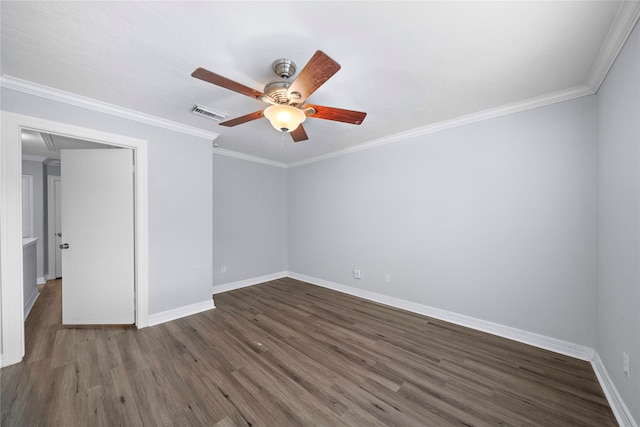 spare room with crown molding, ceiling fan, and dark hardwood / wood-style floors