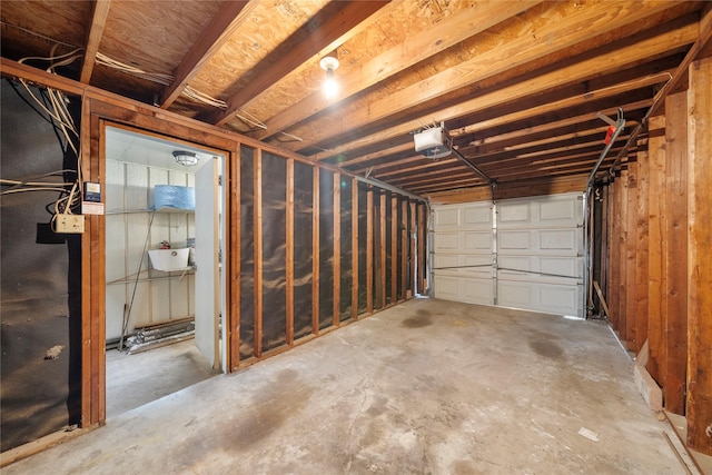 garage featuring a garage door opener