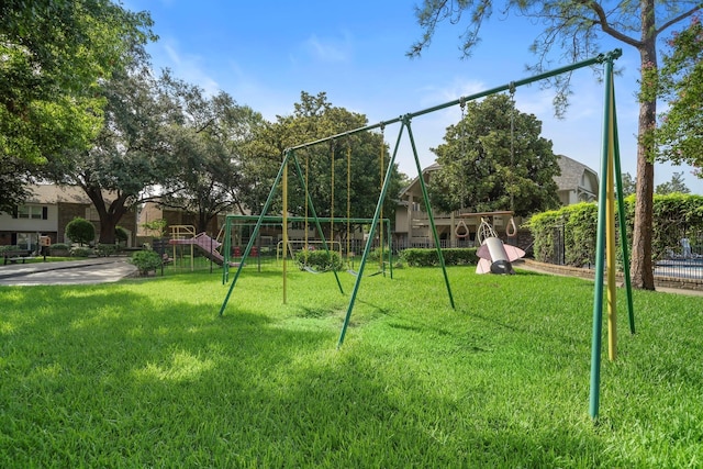 view of playground featuring a lawn