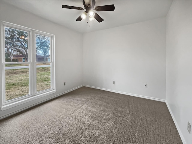 5210 3rd St, Danbury, TX 77534 - carpeted spare room with ceiling fan and baseboards