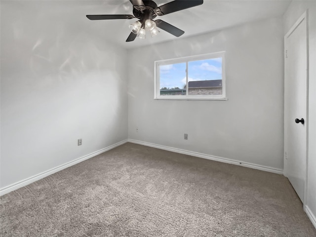 5210 3rd St, Danbury, TX 77534 - empty room with carpet flooring, baseboards, and a ceiling fan