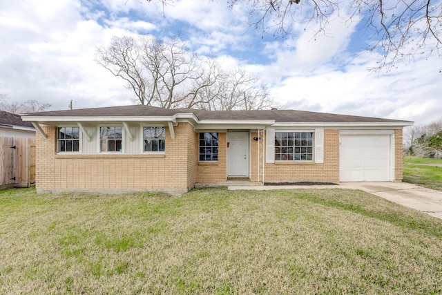 single story home featuring a garage and a front yard