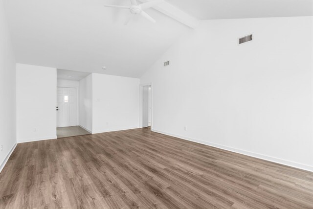 unfurnished room with beamed ceiling, wood-type flooring, high vaulted ceiling, and ceiling fan