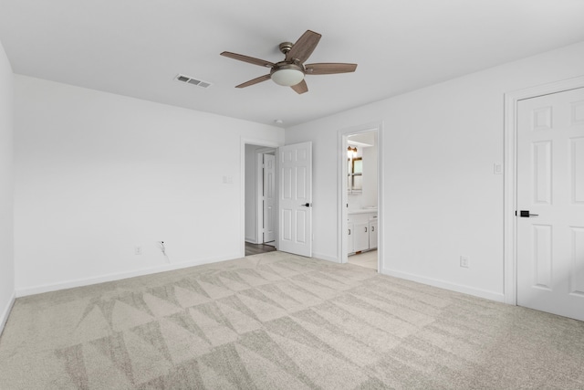 unfurnished room with light carpet and ceiling fan