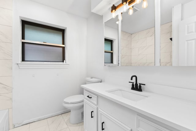 bathroom with vanity and toilet