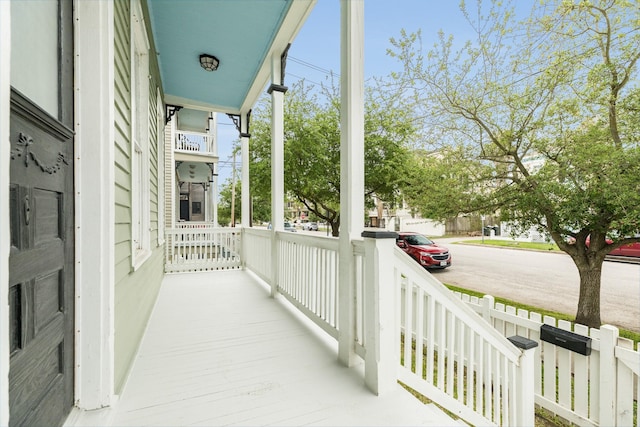 balcony featuring a porch