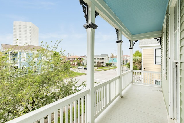 balcony featuring a porch