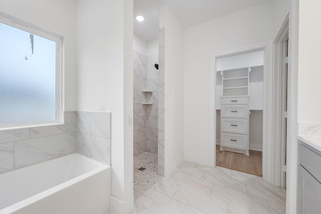 4974 County Road 128, Iola, TX 77861 - bathroom featuring vanity and separate shower and tub