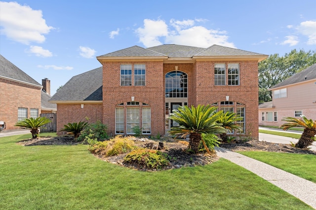 view of front of home featuring a front yard