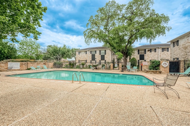 view of pool featuring a patio