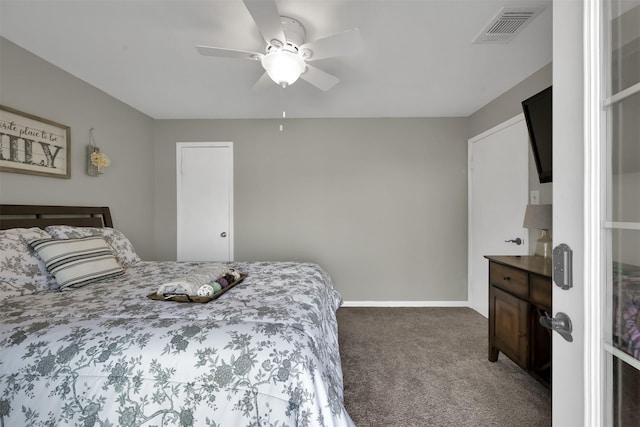 bedroom with ceiling fan and carpet flooring