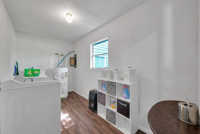 laundry room with dark hardwood / wood-style floors, washer and clothes dryer, water heater, and a textured ceiling