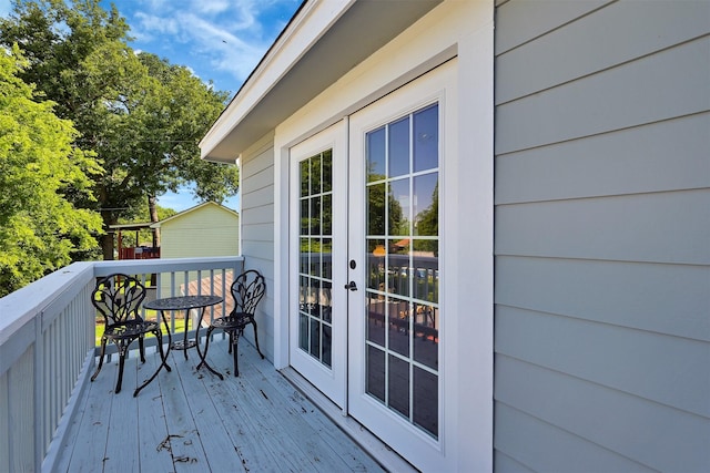 wooden deck with french doors