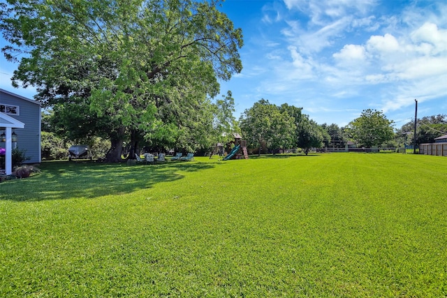 view of yard with a playground