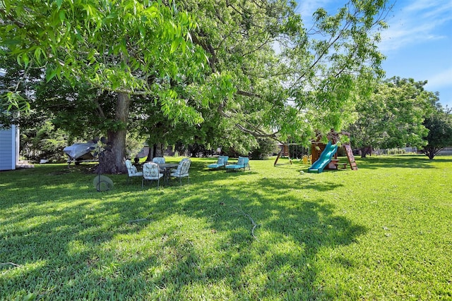 view of yard with a playground