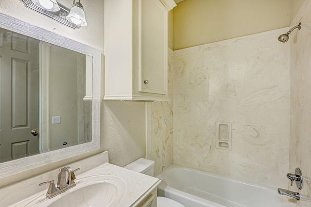 full bathroom with shower / bathtub combination, vanity, and toilet