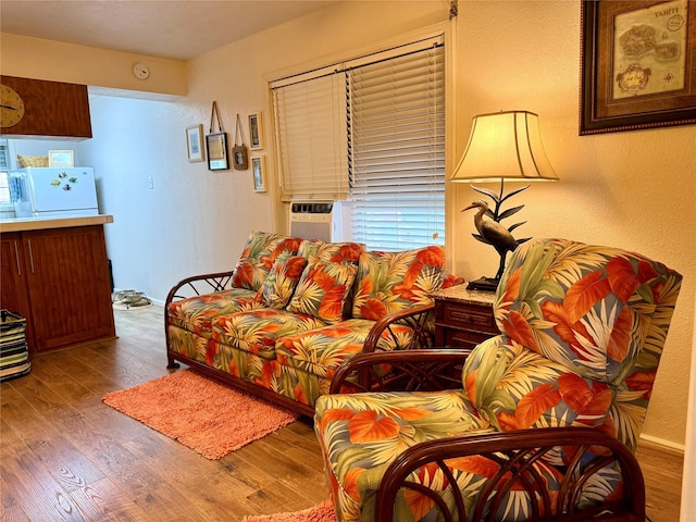 living room featuring dark hardwood / wood-style flooring and cooling unit