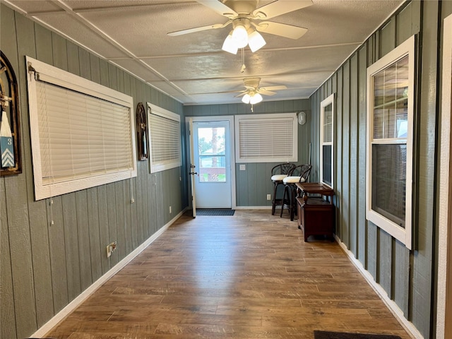 interior space featuring ceiling fan