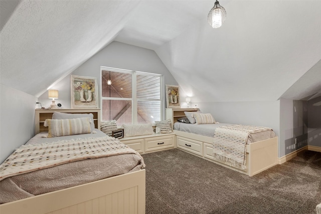 carpeted bedroom with vaulted ceiling