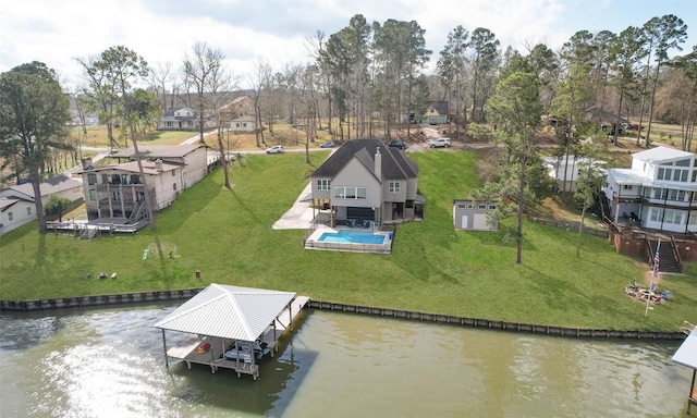 bird's eye view with a water view