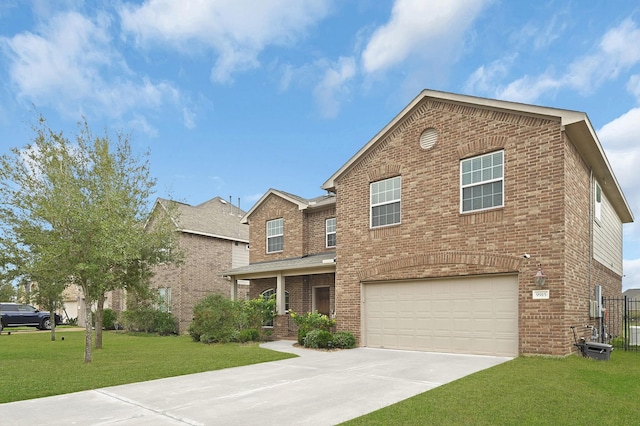 view of front of house featuring a garage and a front lawn