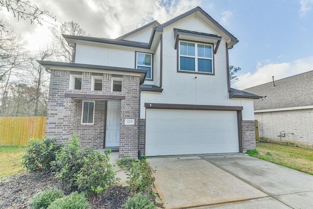 view of front of property with a garage