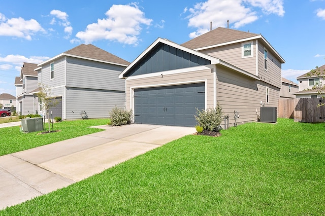 view of side of home featuring a yard, a garage, and central air condition unit