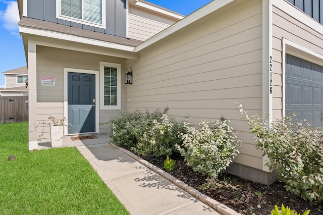 property entrance with a garage