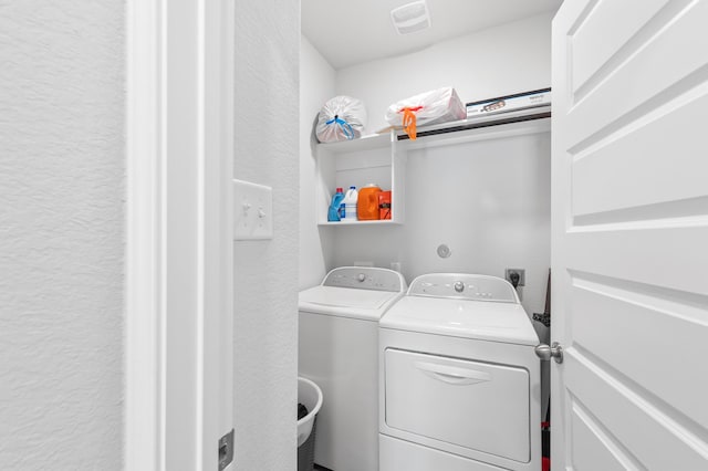 laundry area featuring washer and dryer