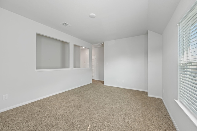 empty room with carpet floors