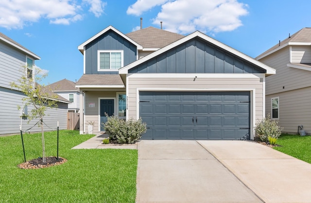 craftsman-style house featuring a garage and a front yard