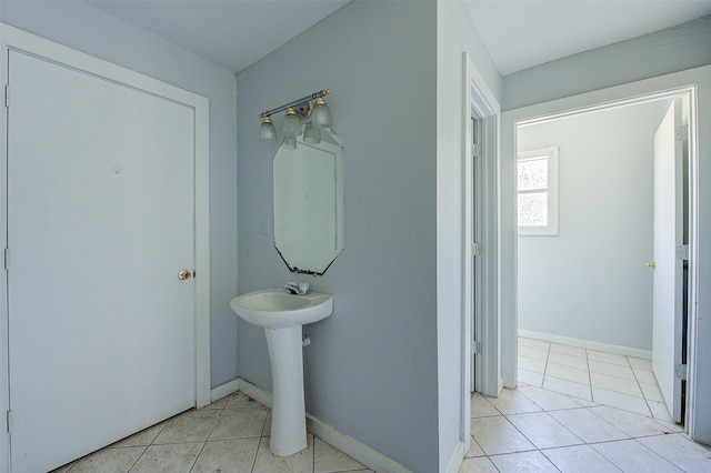 bathroom with sink and tile patterned floors