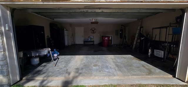 garage featuring white refrigerator