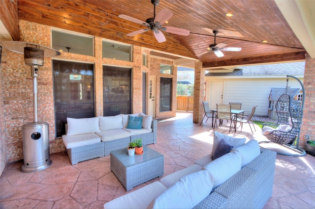 view of patio / terrace with an outdoor living space and ceiling fan