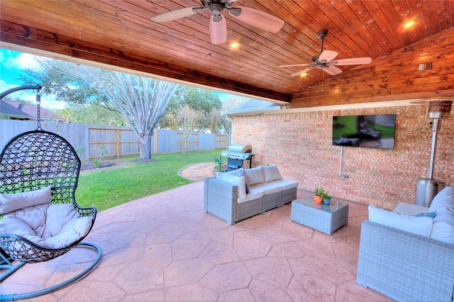 view of patio featuring area for grilling, an outdoor hangout area, and ceiling fan