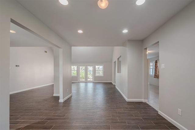 unfurnished living room with french doors