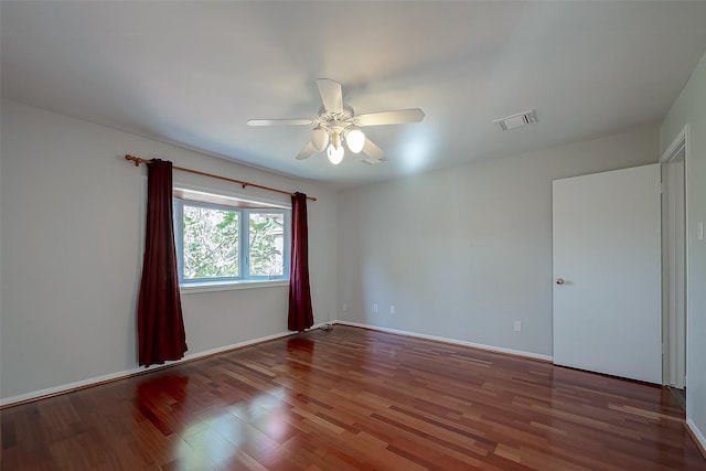 unfurnished room featuring hardwood / wood-style flooring and ceiling fan