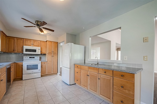 kitchen with sink, white appliances, stone counters, ceiling fan, and decorative backsplash