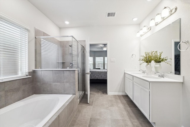 bathroom with ceiling fan, vanity, shower with separate bathtub, and tile patterned flooring