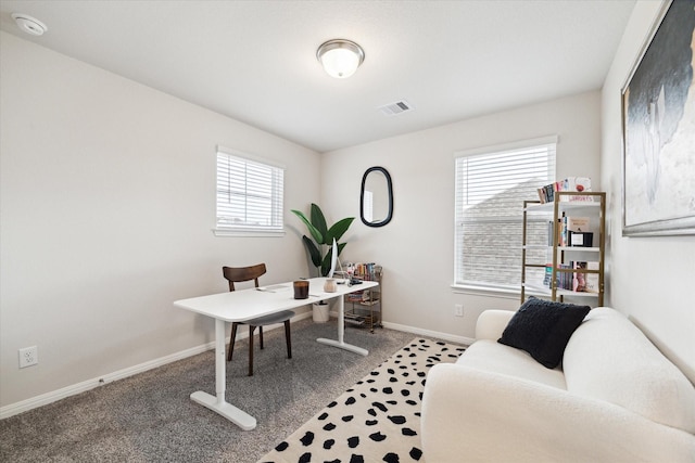 view of carpeted office space