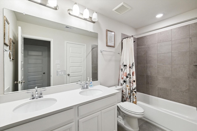 full bathroom featuring shower / tub combo with curtain, vanity, toilet, and tile patterned flooring