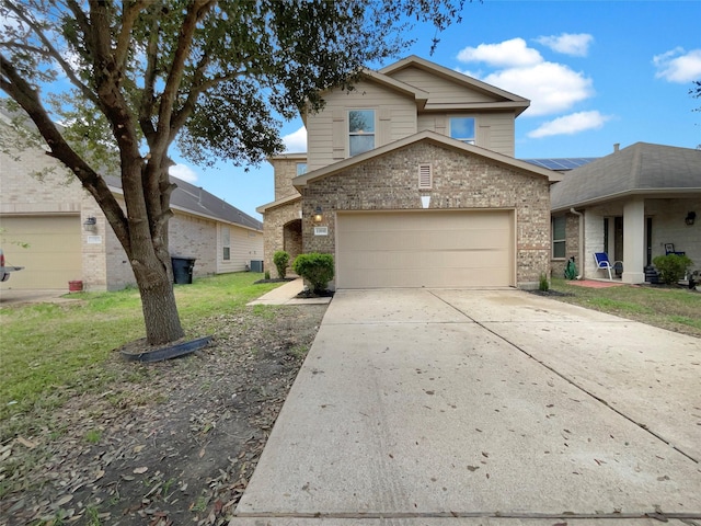 view of property featuring a garage, a front yard, and central air condition unit