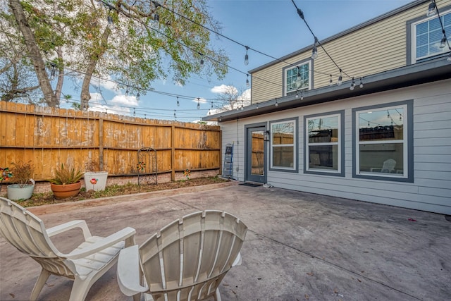 view of patio / terrace with fence