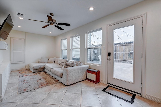 living room featuring recessed lighting, visible vents, baseboards, and light tile patterned floors