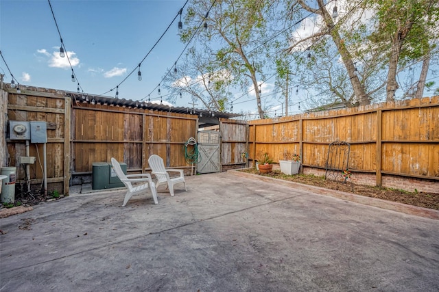 view of patio / terrace with a gate and fence